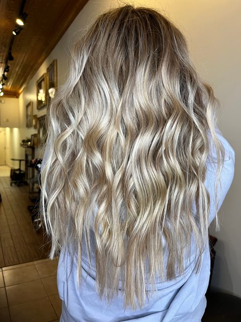 Hand-painted blonde balayage with soft waves, Craft Collective Salon Group