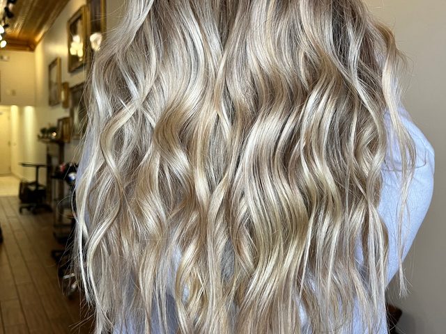 Hand-painted blonde balayage with soft waves, Craft Collective Salon Group