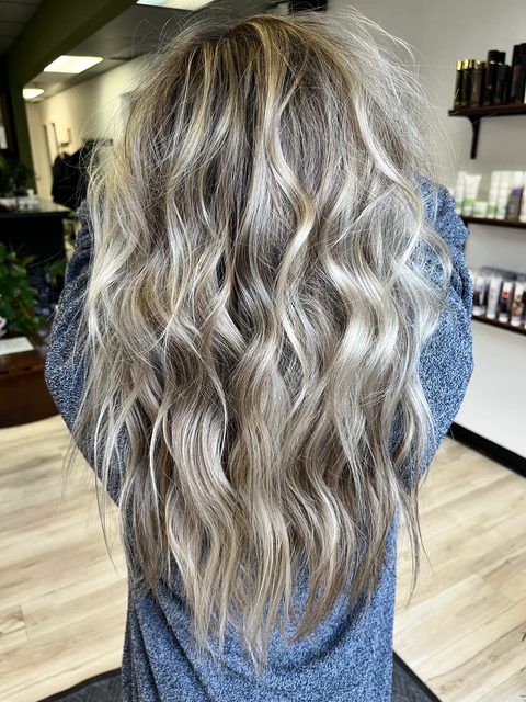 Bright blonde long layers by Craft Collective Salon Group