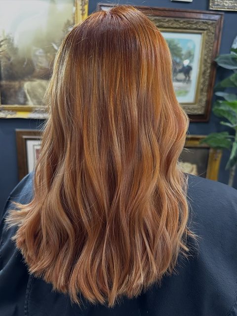 Dimensional copper hairstyle from the Craft Collective Salon Group gallery