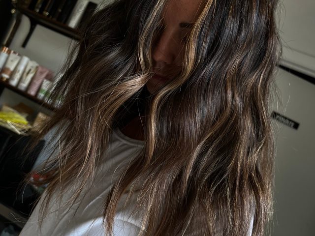 Dimensional brunette-to-blonde balayage by Craft Collective Salon Group