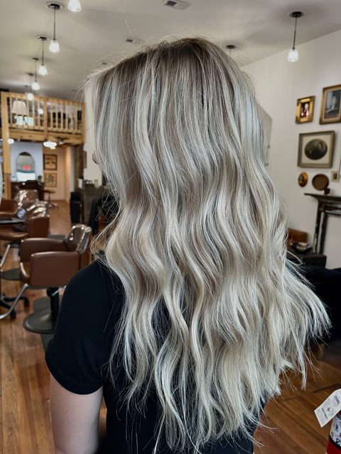 Long icy blonde blonding work by Craft Collective Salon Group